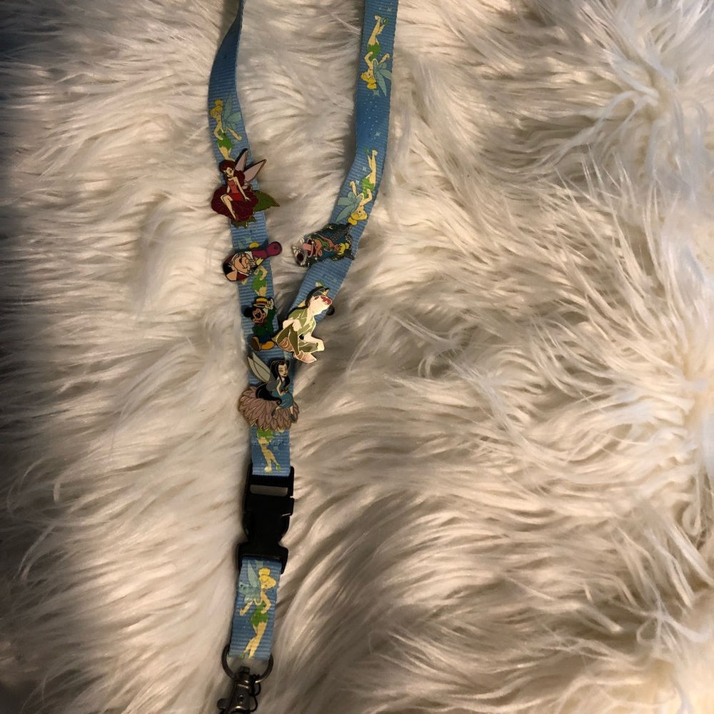 Peter Pan Disney pins and lanyard.